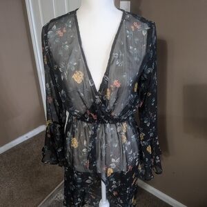 Black with flowers sheer poncho